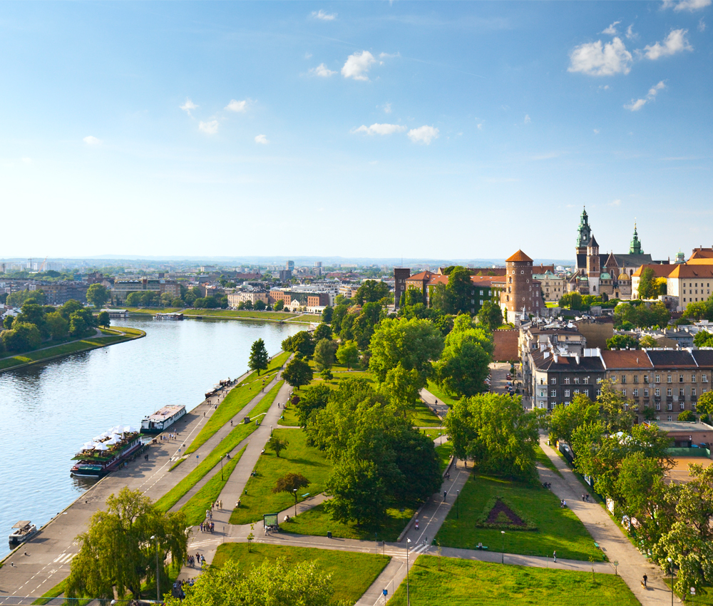 Daytime panorama of Krakow, Poland, featuring Wawel Castle. 