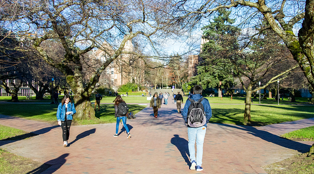 Students walking through the quad on a winter day